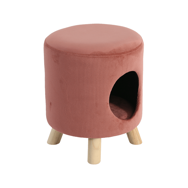 A delicate footstool and pet nest in orange that can be used both ways